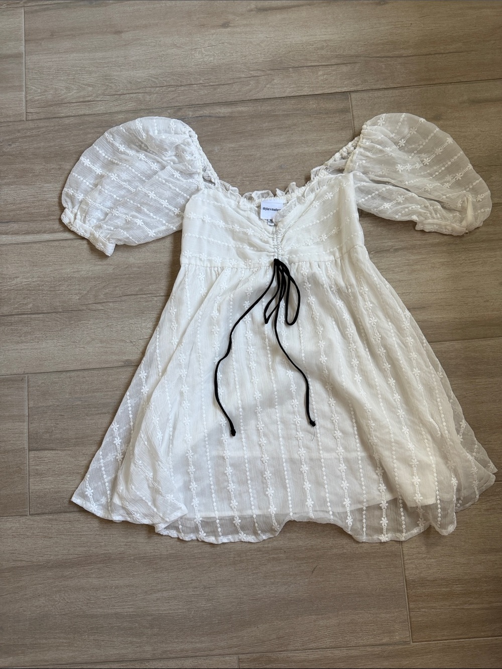 Skylar + Madison White Swiss Dot Mini Dress with Black Tie Detail